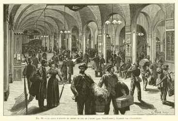 La sala de espera del ferrocarril del Oeste (estación Saint-Lazare), iluminada por la electricidad